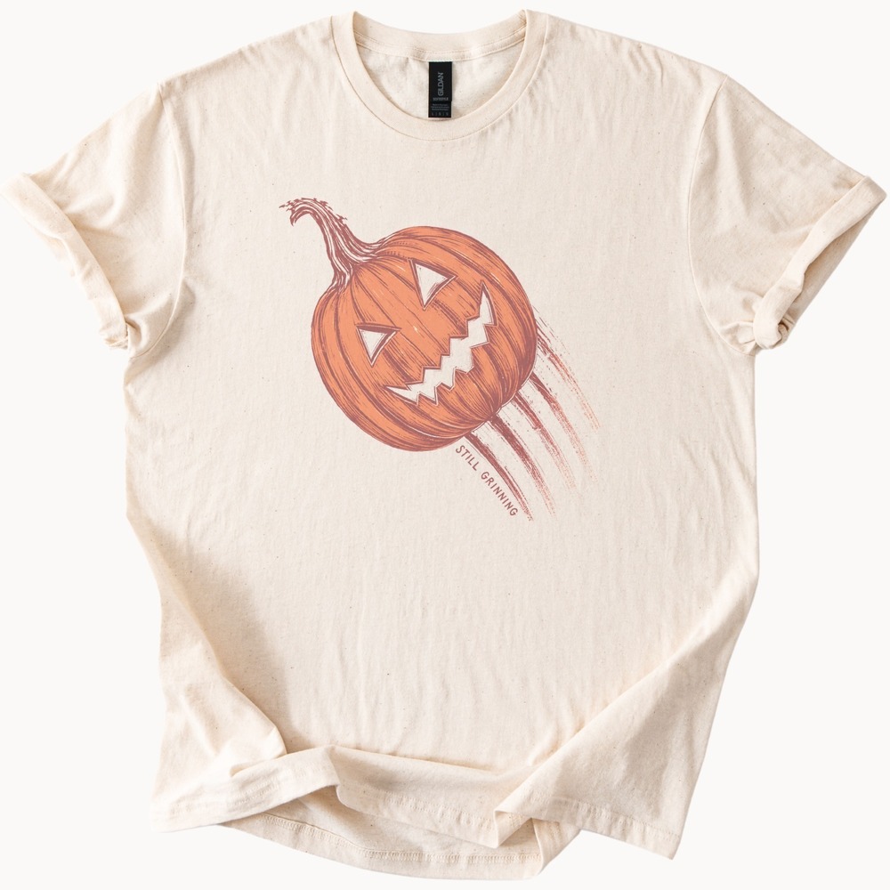 Still Grinning Jack-o'-Lantern Charging Through the Dark Tee